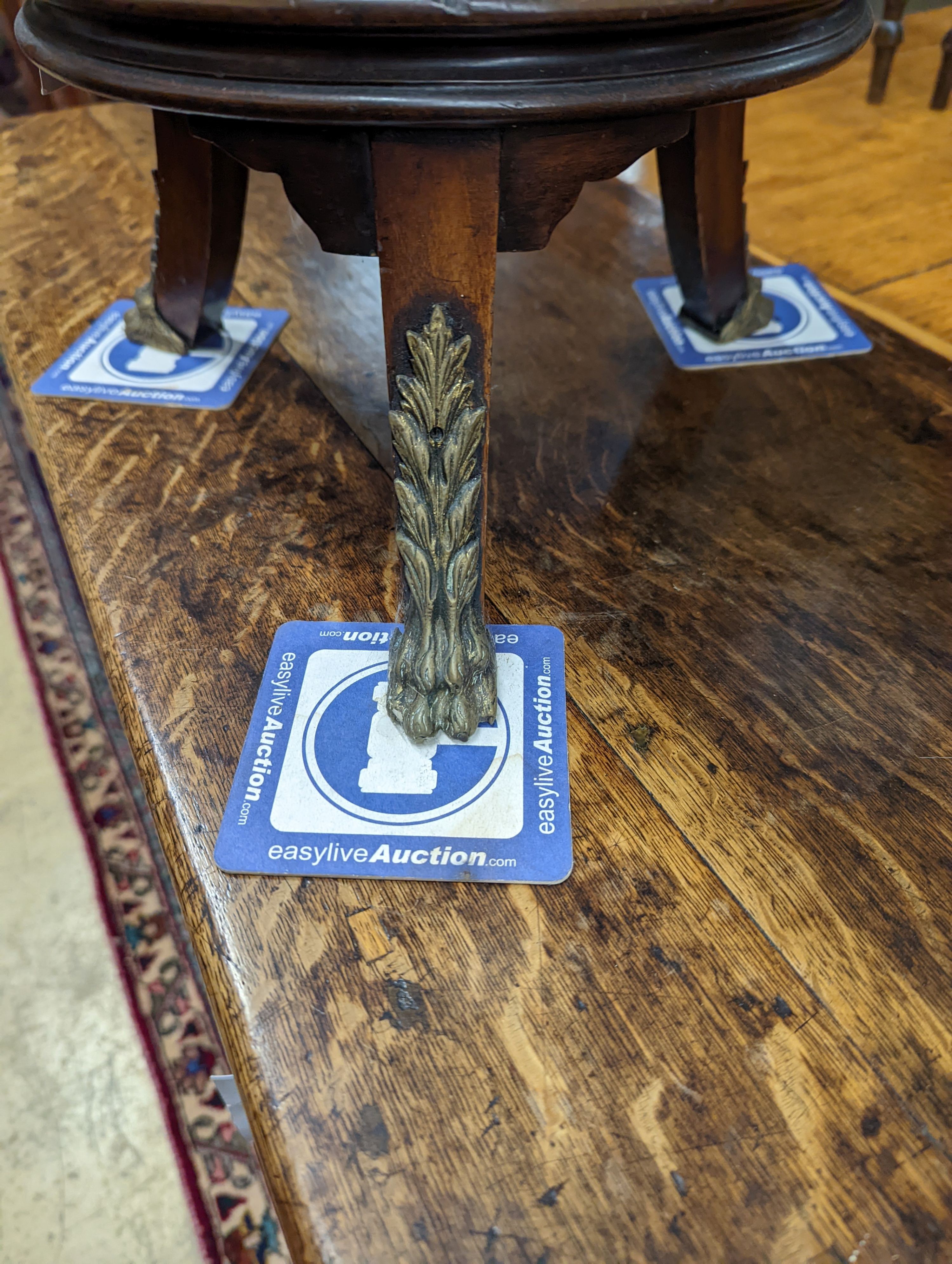 An Edwardian brass mounted mahogany jardiniere with brass liner, diameter 35cm, height 46cm